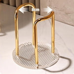 porte verres moderne élégants dorés transparents contenant verres carton beige