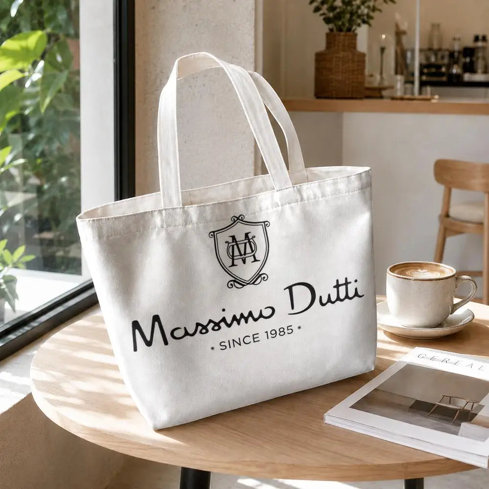 sac main toile blanche pochette logo poignées détachables fermeture éclair
