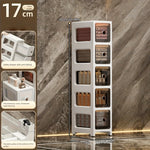 meuble rangement blanc moderne tiroirs transparents rayures diagonales noires pliable porte bouteilles cosmétiques