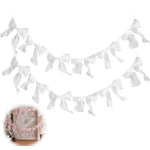 décoration festive guirlande nœuds rose tissu texturé semi transparent mariage anniversaire enfant baby shower