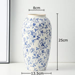 vase classique porcelaine fleurs blanc rouge bleu vert marron decoration table floral