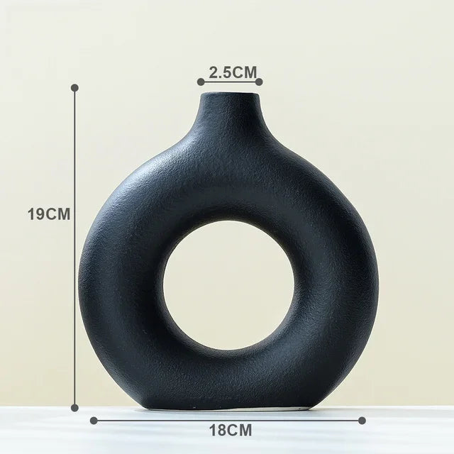 vases modernes roseclair beige noir bougies fleurssséchées décorationintérieure texturegrained minimaliste setdeco
