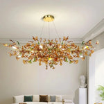 suspension lumineuse moderne feuilles vertes blanches dorées naturelle chambre salon decoration