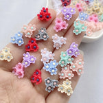 paillettes résine fleurs artificielles miniatures ornements pétale centre rouge rose violet bleu gris beige