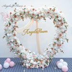 Arche fleurs rose romantique décoration extérieure mariage anniversaire événement table