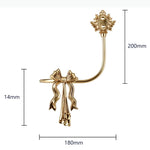 boucles rideau or ailes sculptées classiques décoratives noels dorés deux pièces