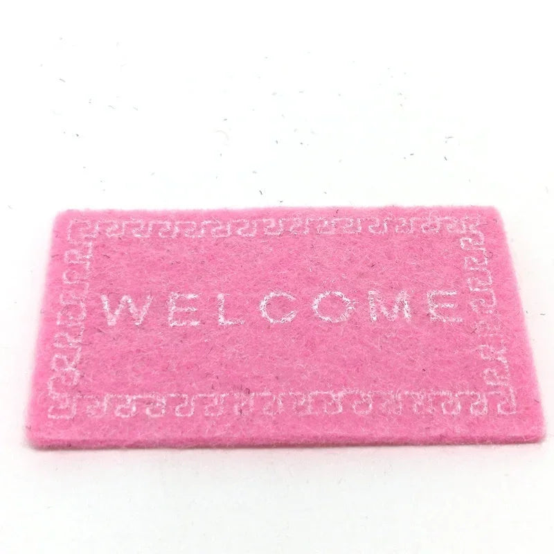 tapis bienvenue rouge rose noir marron motif géométrique moderne adhésif inclusion tapis