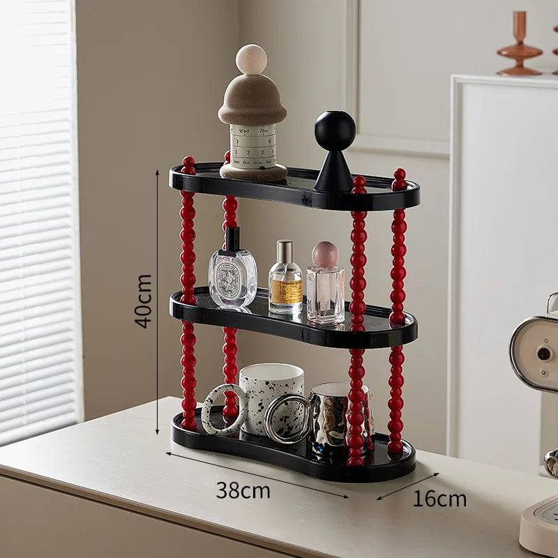 étagère trois niveaux moderne minimaliste blanc noir cosmétiques parfums tasses blancs