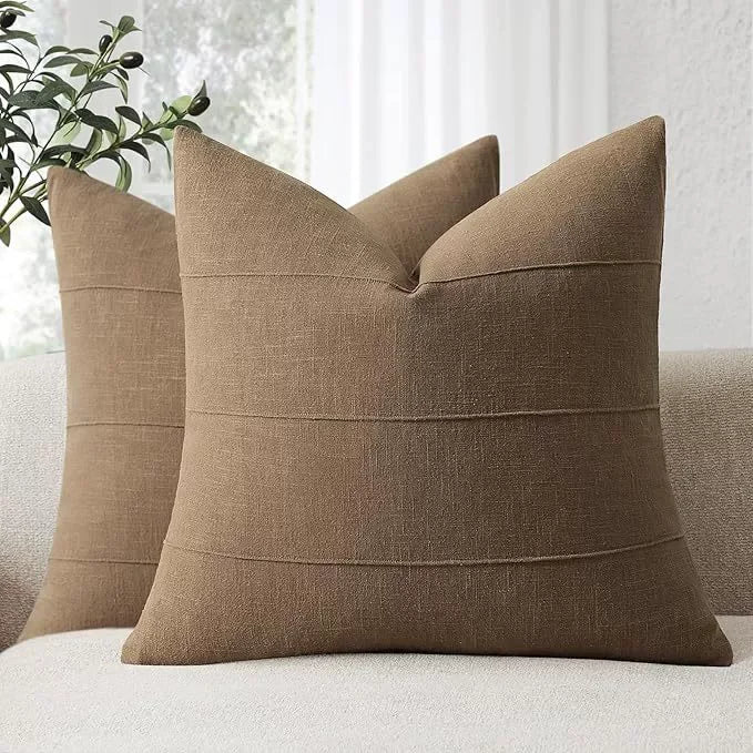 coussins décoratifs tissu texturé brun rouille beige bleu marine vert olive moderne minimaliste