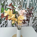 bouquet artificiel feuilles vert bleu vase blanc décoration intérieure moderne minimaliste