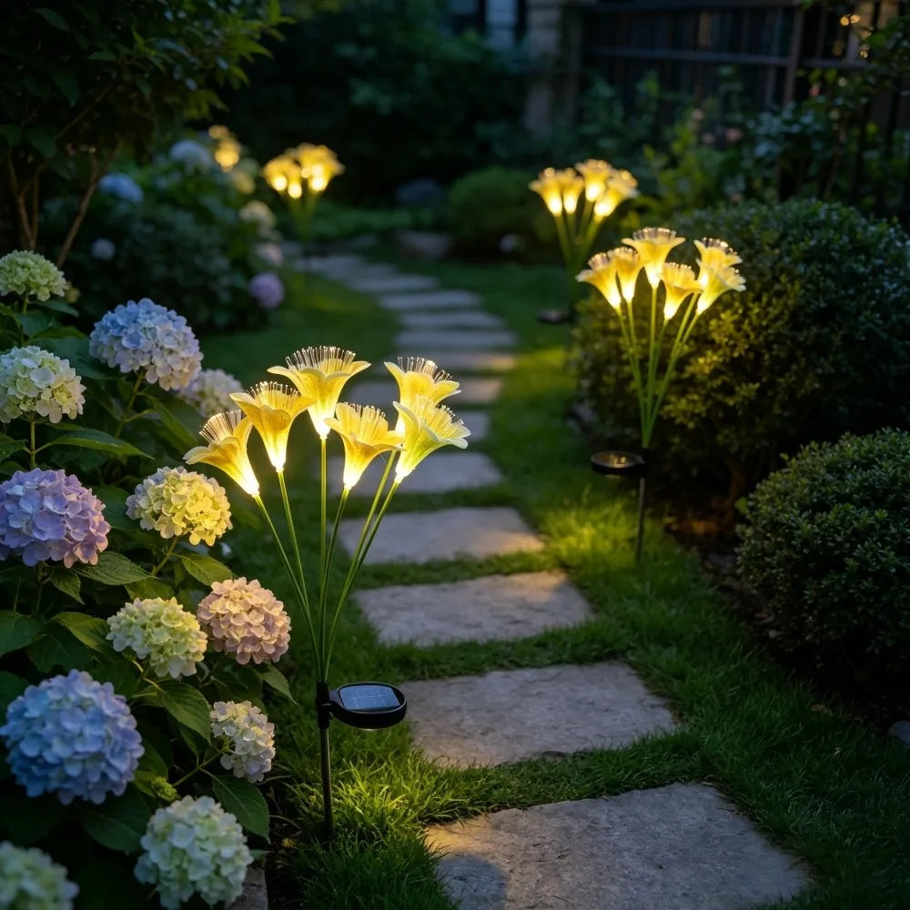 lampions solaires fleurs lys blanc jaune rose modernes extérieurs patio jardin piquet métallique led