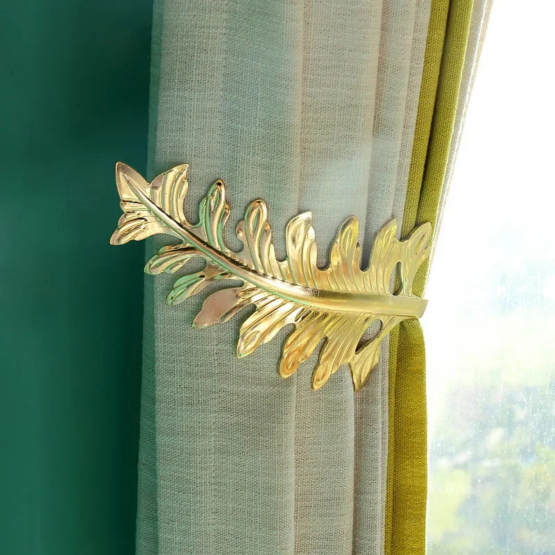 pince rideau feuille stylisée moderne métal fer couleur dorée fixations decorationintérieur anneaux boucles