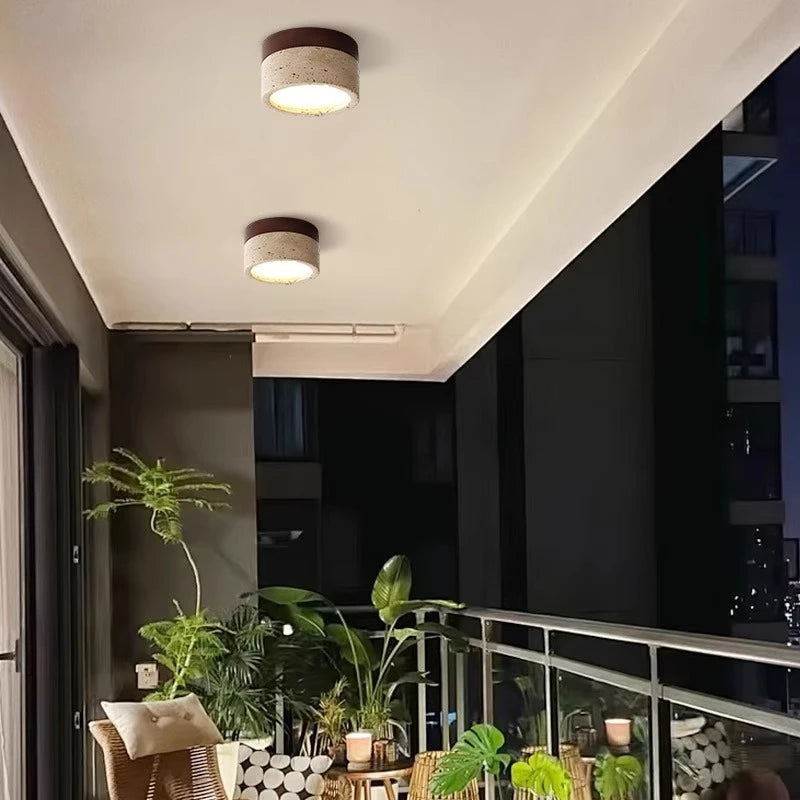 lampe moderne minimaliste bois pierre texture naturelle beige brun foncé éclairage led murale