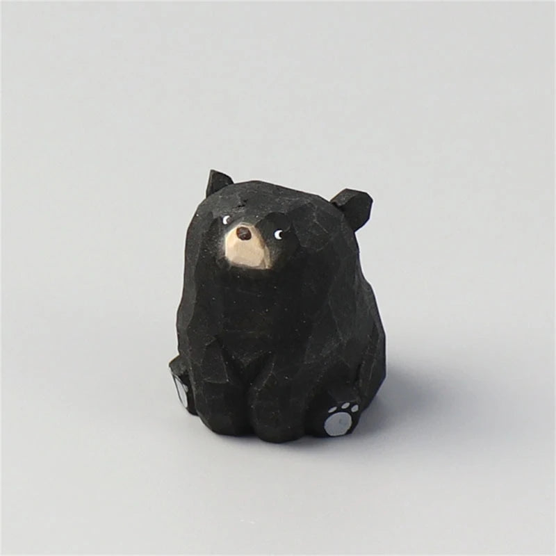 statue animale bois figurine bleu rose motif floral minimaliste yeux stylisés petite deco