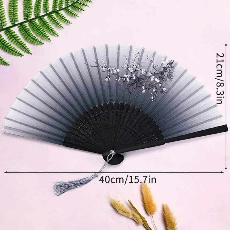 éventail pliant traditionnel bambou motif fleurs cerisier pompon mariage élégant