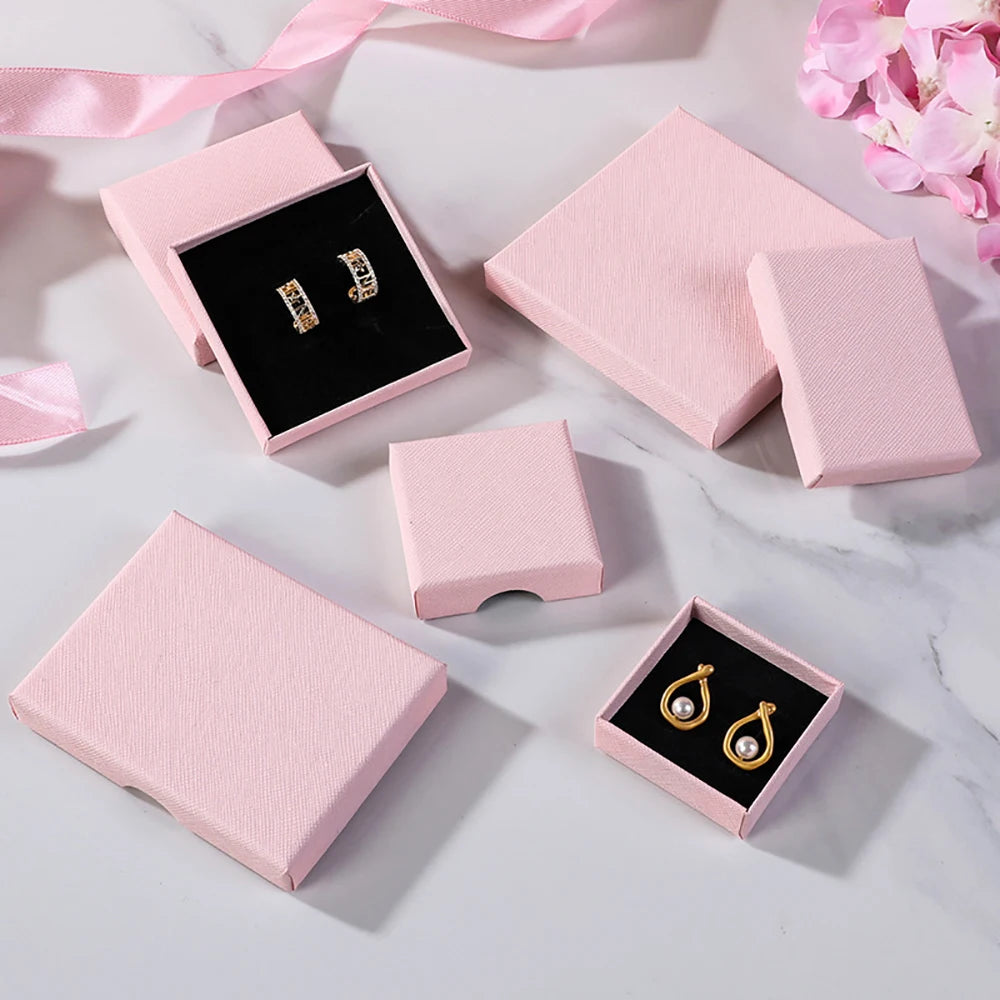boîtes bijoux rose rayées rangement colliers boucles oreilles bracelets diamants nouveau anoël valentin