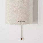 lampe murale moderne beige clair tissu cordon pompon doré chambre entrée étude led 6000k