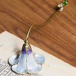 extingueur bougie chauffe plat or violet élégant artisanal tringle support métallique fleurs stylisées brillant