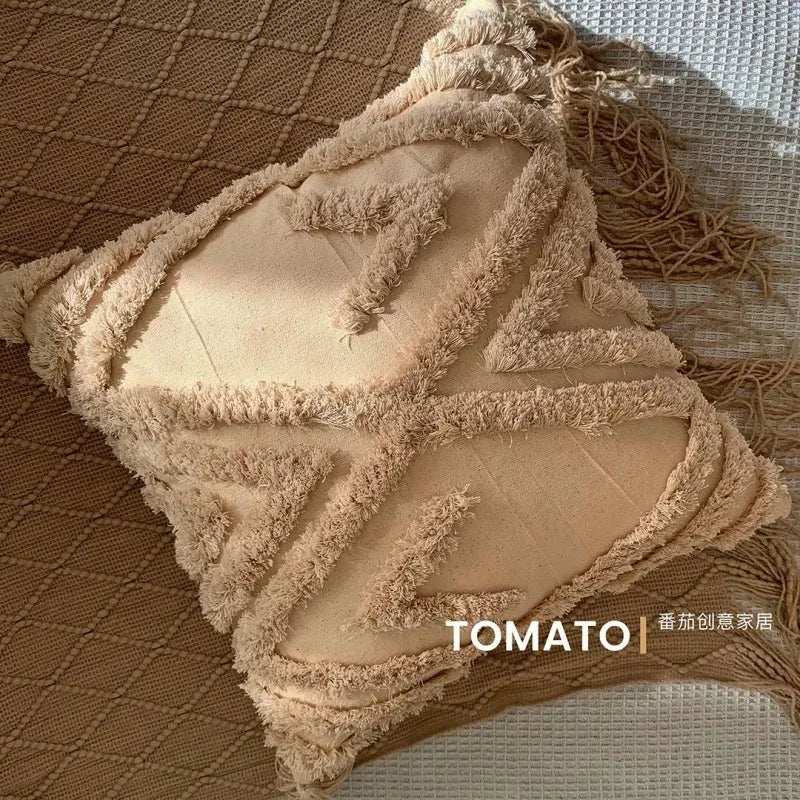 taies d'oreiller géométriques brodées boho chic couleurs beige orange gris franges respectueuses environnement decoration