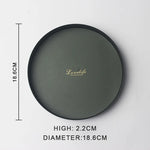 présentoir rond moderne plateau uni vert foncé orange noir maquillage soins parfums cosmétiques table