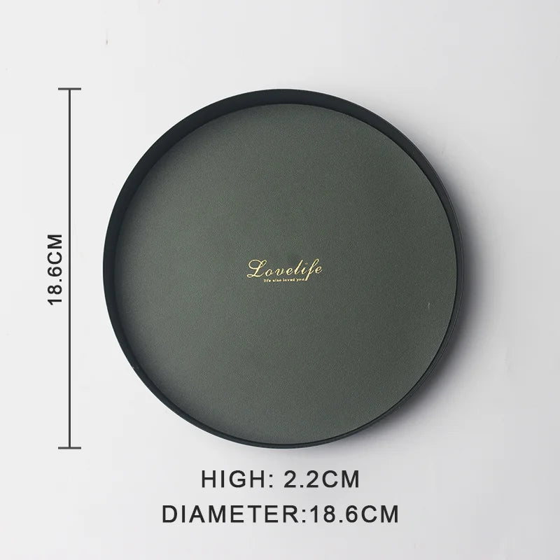présentoir rond moderne plateau uni vert foncé orange noir maquillage soins parfums cosmétiques table