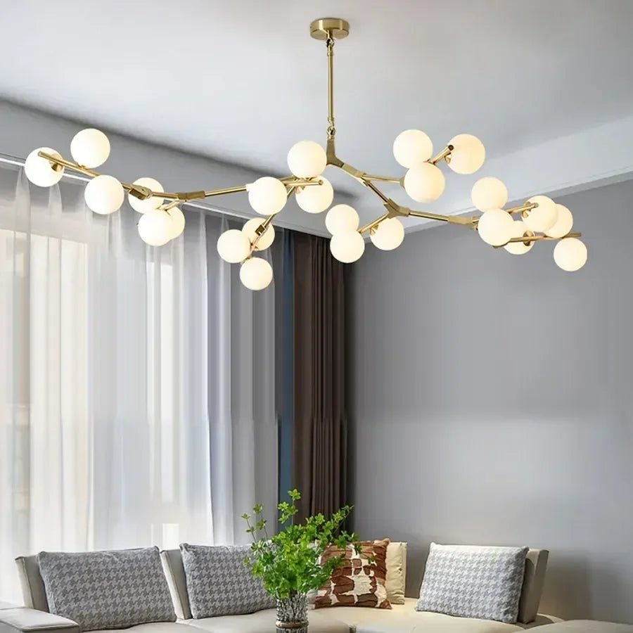 lustre suspension moderne boules verre translucides branches métal doré blanc salon salle manger