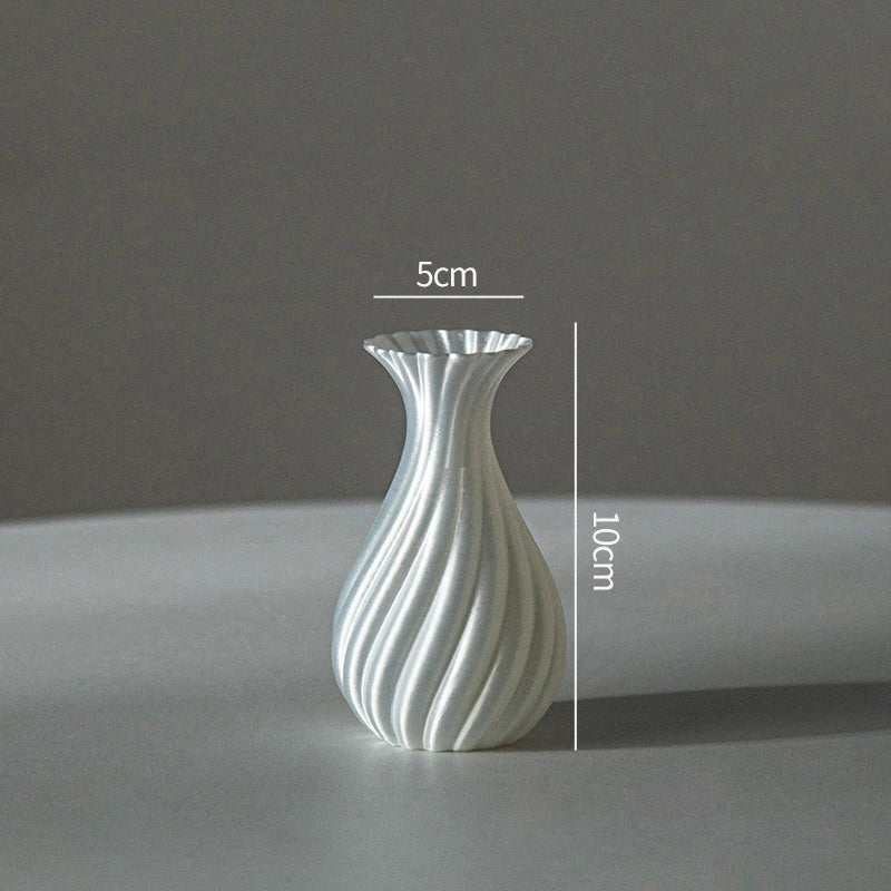 vase moderne décoration intérieure vase texturé noir fleurs artificielles calendrier cadre photo livres parfum