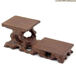 support table bois sculpté artisanal marron foncé miniatures collections décoration