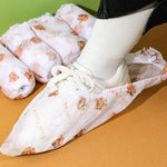 protège chaussures jetables blanc orange gris élastiques petits animaux good luck moderne pratique