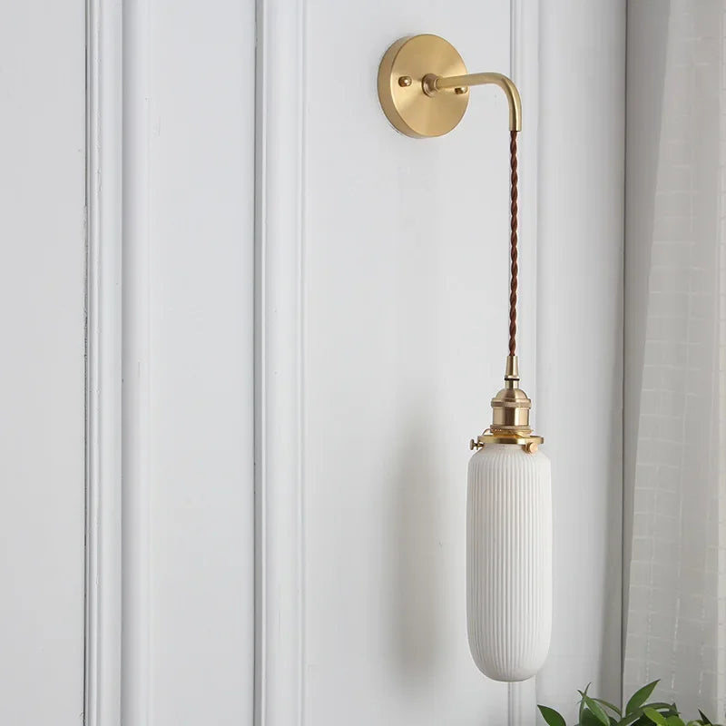 Détail de l'applique murale LED en fer et céramique blanche