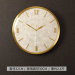 horloge murale moderne or blanc cadran marbré aiguille salon étude