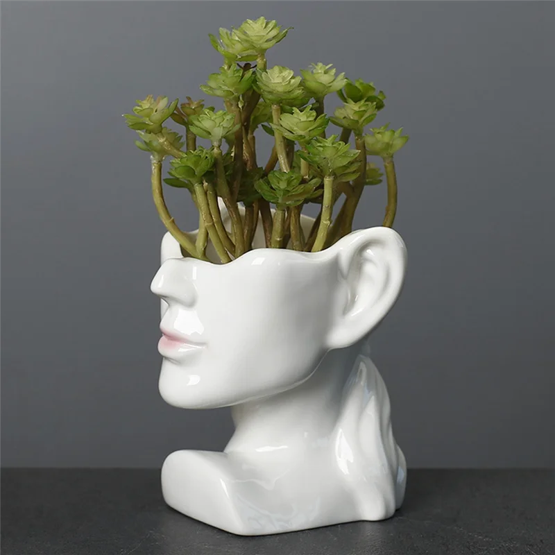 cache candélabre moderne buste humain blanc noir pot fleur porcelaine sculptural unique