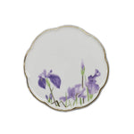 Assiette décorative avec de belles fleurs violettes.