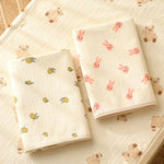 serviettes bébé imprimées visages coeurs beige enfantin couverture couches motifs décoratives