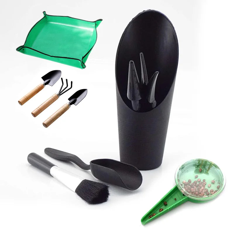 ensemble jardinage outils pelle houe brosse sac semis arrosoir pot fleurs vert noir moderne