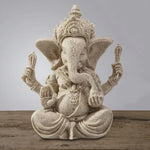 statue ganesha résine sculptée décorative religieuse éléphant fleurs blanches maison
