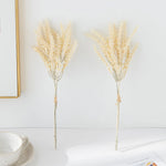 décoration intérieure bouquet feuilles artificielles naturel minimaliste beige gris doré
