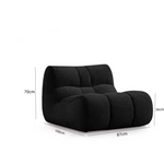 Fauteuil moderne tissu bouclé beige clair coussins d'assise dossier minimaliste