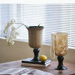 vase table couleur marron beige noir texture marbrée motifs floraux classique élégant base solide