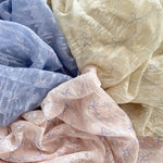 tissu polyester coton rose clair beige bleu clair motif nœuds fleurs élégant romantique 150cm