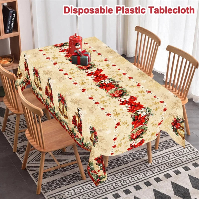 nappe table noël cloches dorées fleurs rouges feuilles vertes guirlandes flocons dorés classique