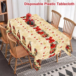 nappe table noël cloches dorées fleurs rouges feuilles vertes guirlandes flocons dorés classique