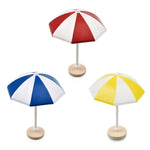 parasols miniatures décorations paysage moderne rouge blanc bleu jaune rayures horizontales tringle base circulaire