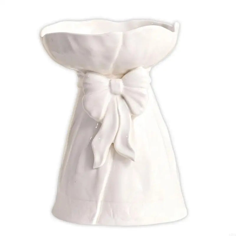 vases decoratifs blanc fleurs artificielles roses plis tissu nœud papillon romantique table salon