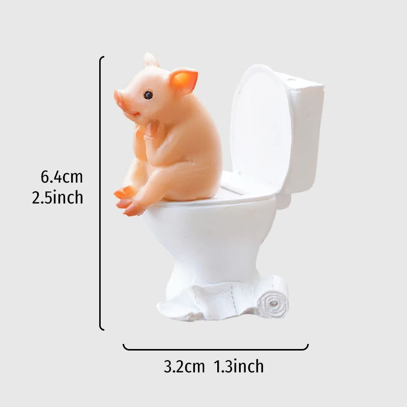 figurine porc rose toilette blanche résine décorative cartoon intérieur humour