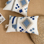 housse coussin carré boho chic motifs géométriques pompons couleur neutres décor maison