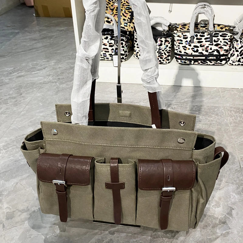 sac main femme toile vintage vert olive marron poches poignet fermé loquet polyvalent durable