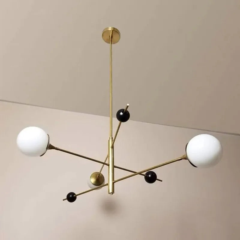 suspension lumineuse moderne or noir sphères blanches led minimaliste structure métallique chromé six globes