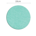 supports verre adhésifs tapis diatomées rond carré gris rose bleu texture granuleuse minimaliste maison
