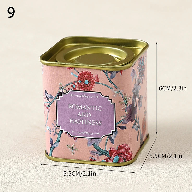 boîtes métal bleu rose noir fleurs vintage capsules étiquettes messages conservation snacks thé